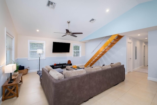 453 Lime Dr, Key Largo, FL 33037 - living area featuring lofted ceiling, a ceiling fan, stairway, light tile patterned floors, and baseboards