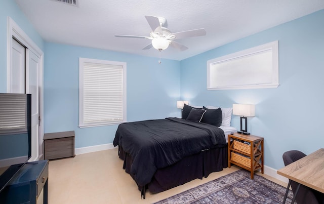 453 Lime Dr, Key Largo, FL 33037 - bedroom featuring baseboards, ceiling fan, and a closet