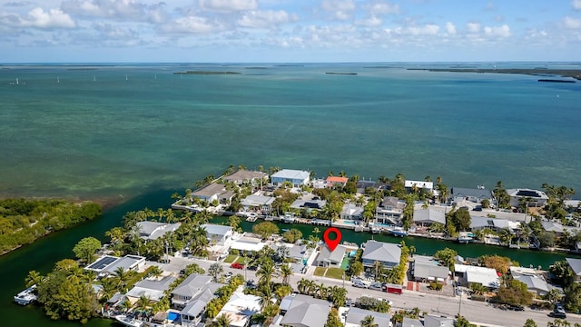 bird's eye view featuring a residential view and a water view