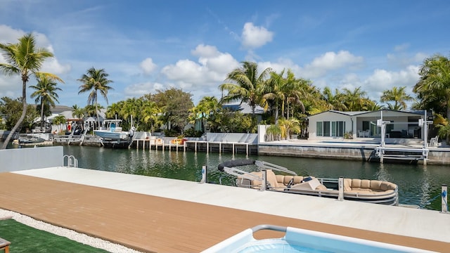 dock area with a water view