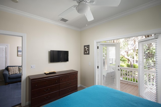 bedroom with ceiling fan, ornamental molding, and access to exterior