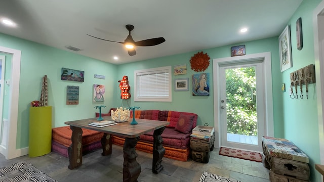 dining room with ceiling fan