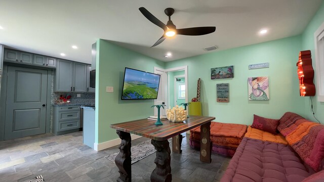 dining space featuring ceiling fan