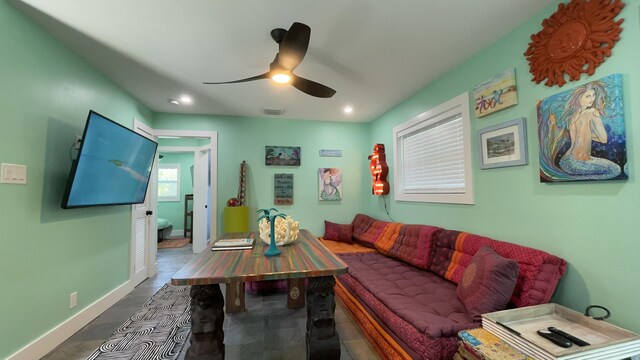 living room with ceiling fan