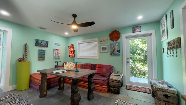 dining room featuring ceiling fan