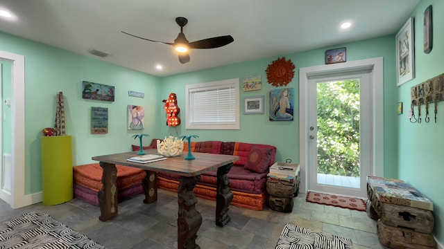 dining space featuring ceiling fan