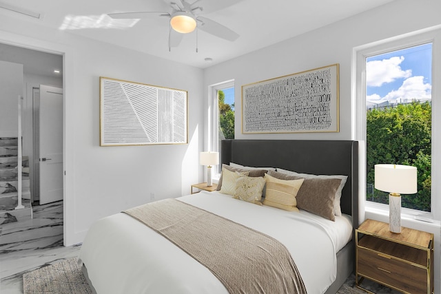 bedroom featuring ceiling fan