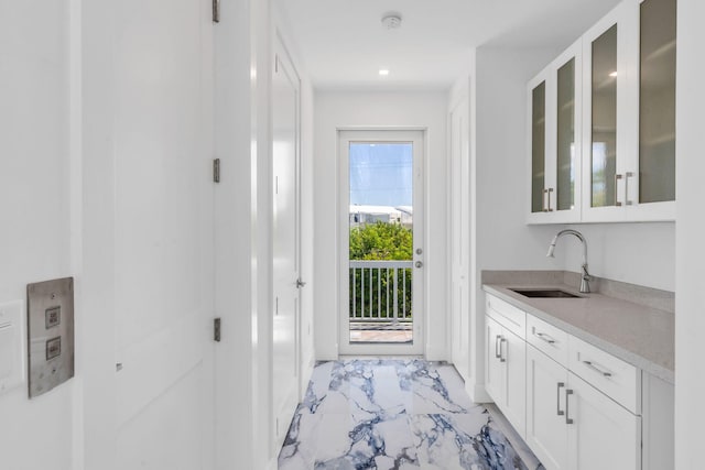 doorway featuring sink