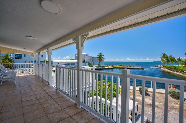 balcony featuring a water view