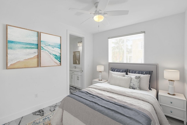 bedroom featuring connected bathroom and ceiling fan