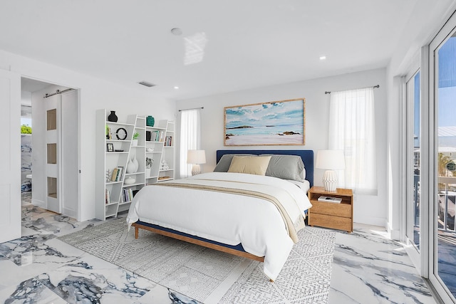 bedroom with a barn door