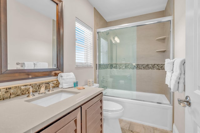 2394 Coco Plum Dr, Marathon, FL 33050 - bathroom featuring toilet, combined bath / shower with glass door, and vanity
