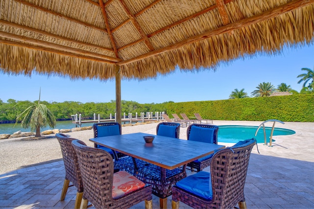 2394 Coco Plum Dr, Marathon, FL 33050 - view of patio featuring a gazebo, outdoor dining space, and a water view