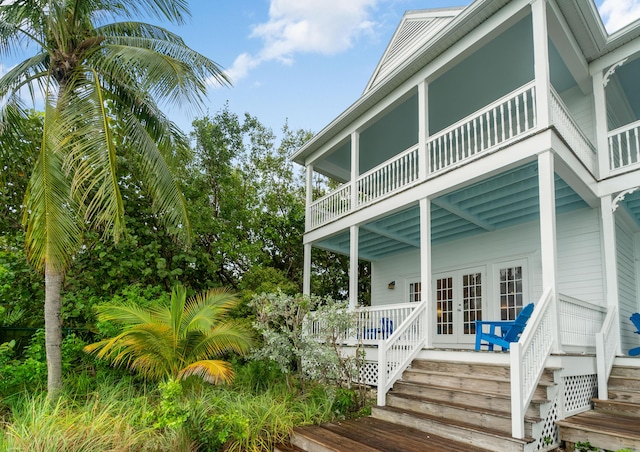 wooden deck featuring french doors