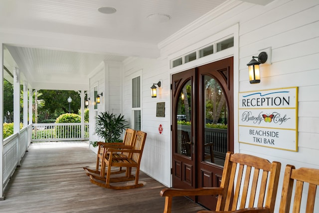 property entrance featuring covered porch