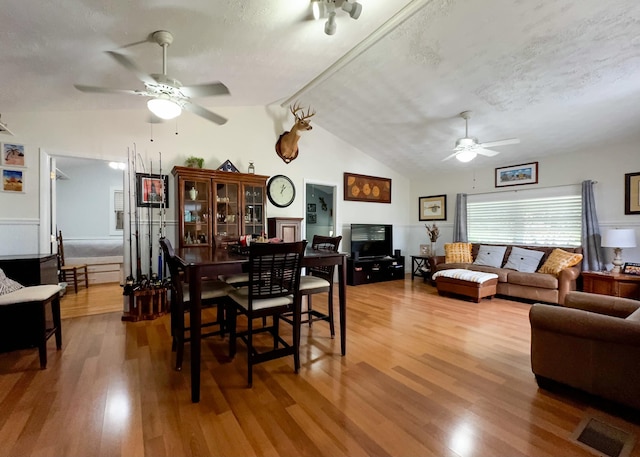 2 Riviera Dr, Big Coppitt, FL 33040 - dining area featuring wood finished floors, a textured ceiling, lofted ceiling, and ceiling fan
