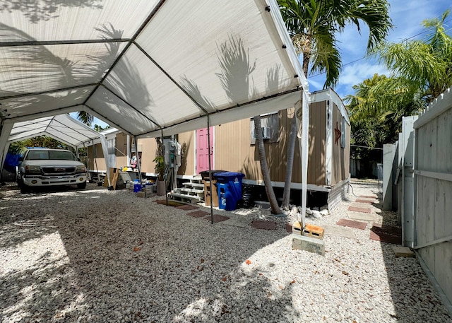2 Riviera Dr, Big Coppitt, FL 33040 - exterior space with a carport, entry steps, and fence