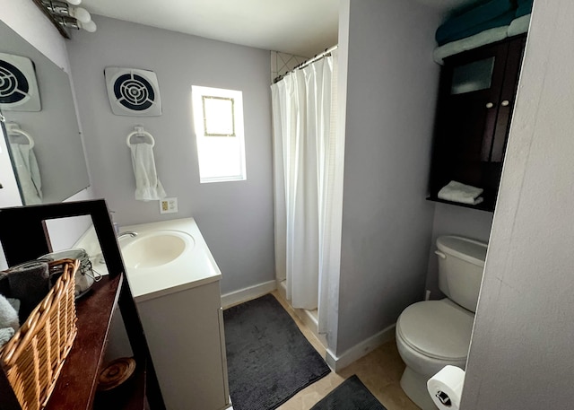 2 Riviera Dr, Big Coppitt, FL 33040 - full bath with vanity, a shower with shower curtain, baseboards, visible vents, and toilet