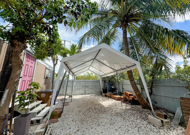 2 Riviera Dr, Big Coppitt, FL 33040 - view of patio / terrace featuring a gazebo, a detached carport, and a fenced backyard