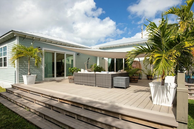 exterior space with a wooden deck and an outdoor living space