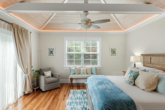 bedroom with wood ceiling, crown molding, vaulted ceiling, and hardwood / wood-style flooring