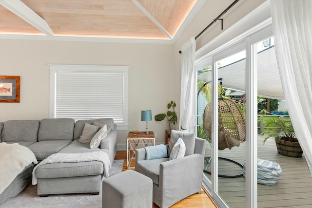 living room featuring wood ceiling, vaulted ceiling, and light wood-type flooring