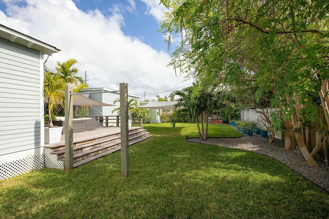 view of yard featuring an outdoor living space and a deck