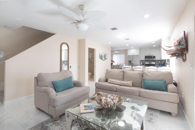 living room featuring baseboards, visible vents, ceiling fan, marble finish floor, and recessed lighting