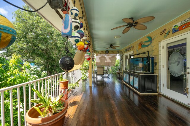 exterior space featuring ceiling fan