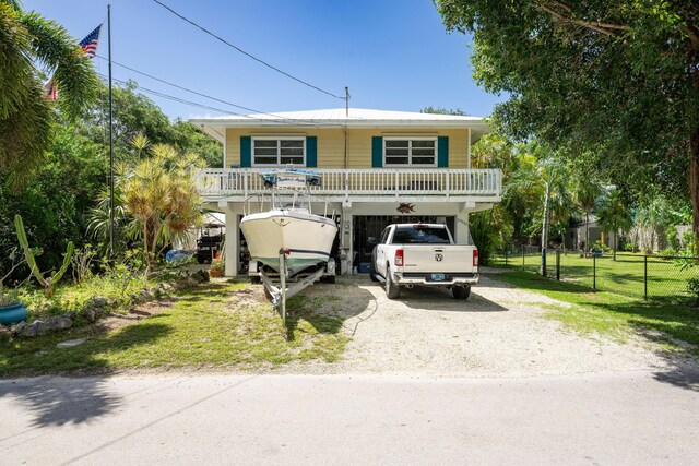 coastal home featuring a carport