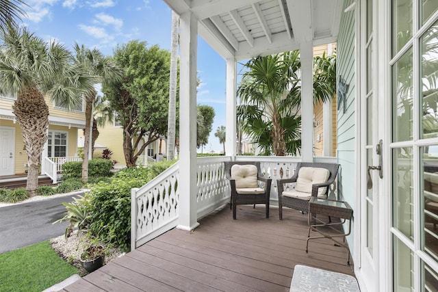 wooden deck featuring a porch