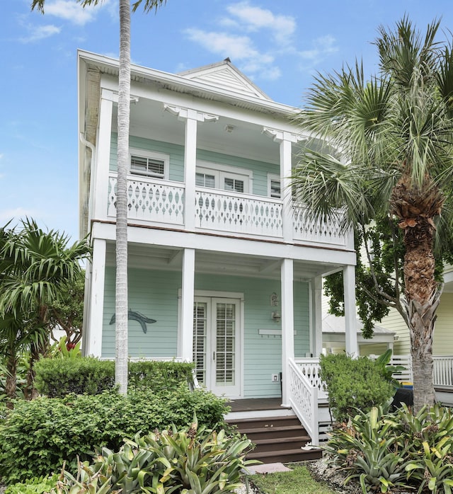 view of front of property with a balcony