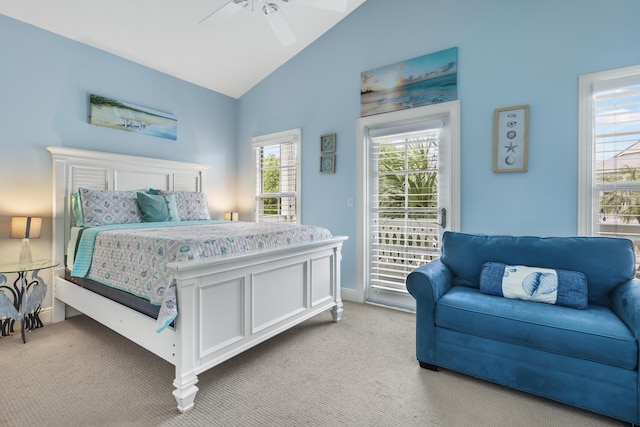 carpeted bedroom featuring ceiling fan, lofted ceiling, and access to exterior