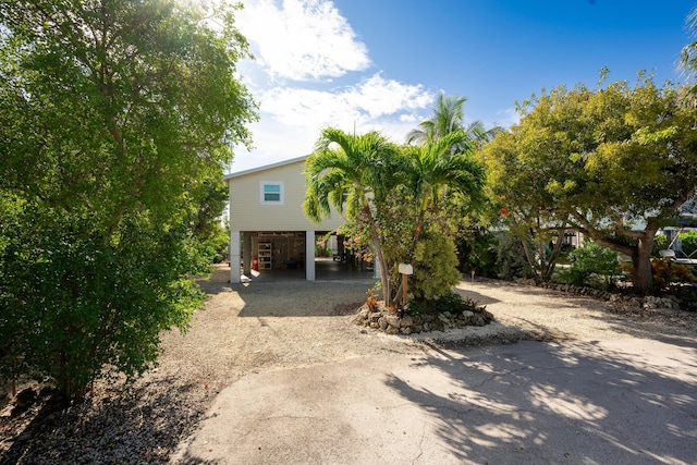 view of front of property featuring a carport