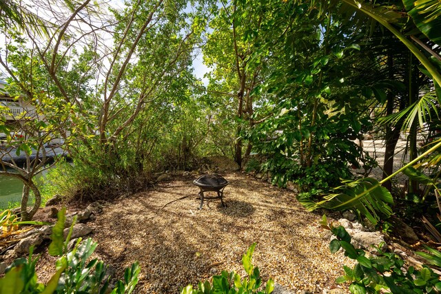 view of patio / terrace with a fire pit