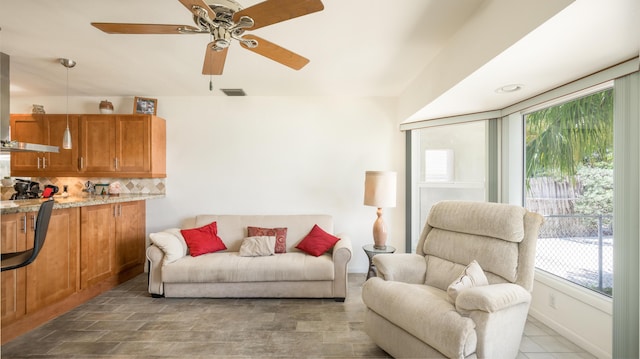 living room with ceiling fan