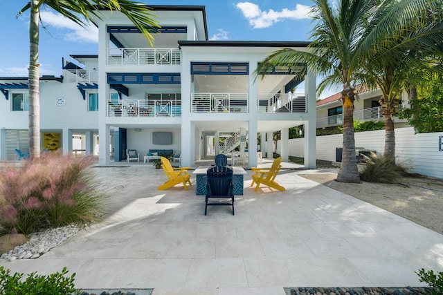 rear view of house with a patio