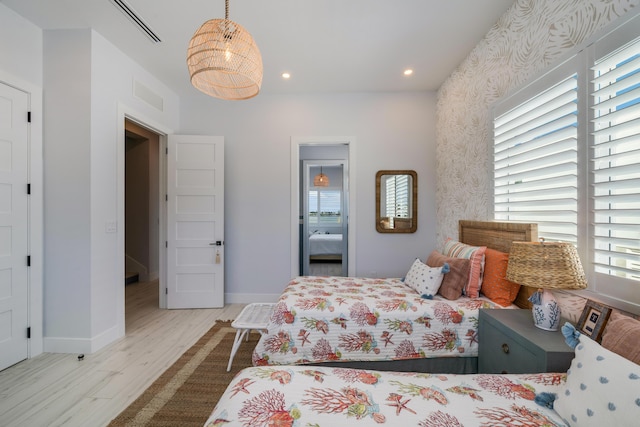 bedroom featuring light hardwood / wood-style flooring