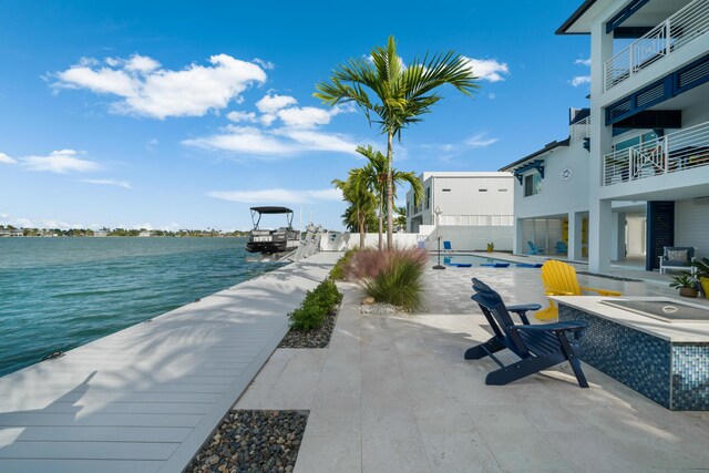 view of patio / terrace featuring a water view