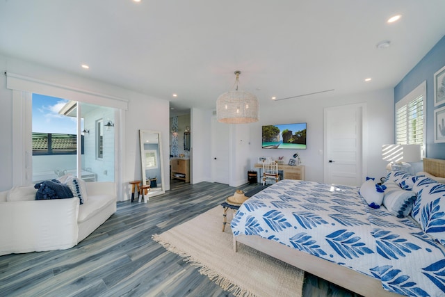 bedroom with hardwood / wood-style floors