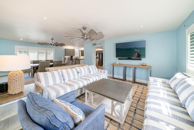 living room featuring ceiling fan