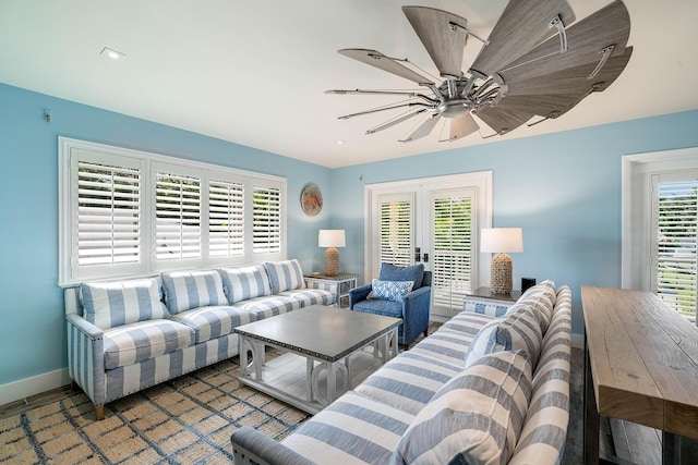 living room featuring ceiling fan