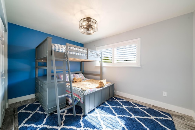 bedroom featuring dark wood-type flooring