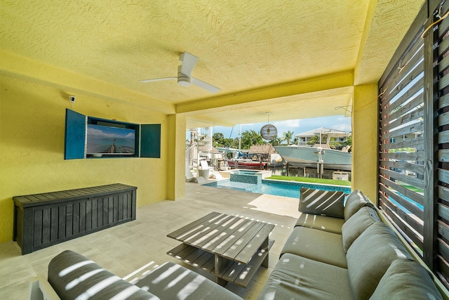 view of patio with ceiling fan