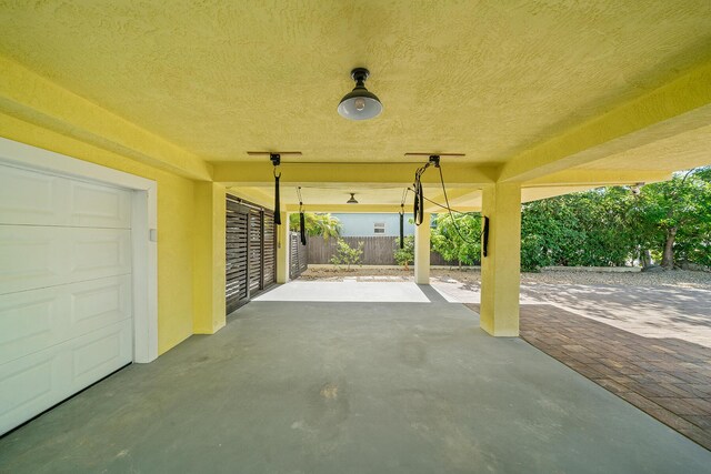 view of patio featuring a garage