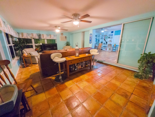 living room with an AC wall unit