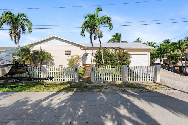 view of front of property with a garage