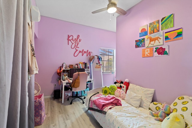 bedroom featuring hardwood / wood-style flooring and ceiling fan