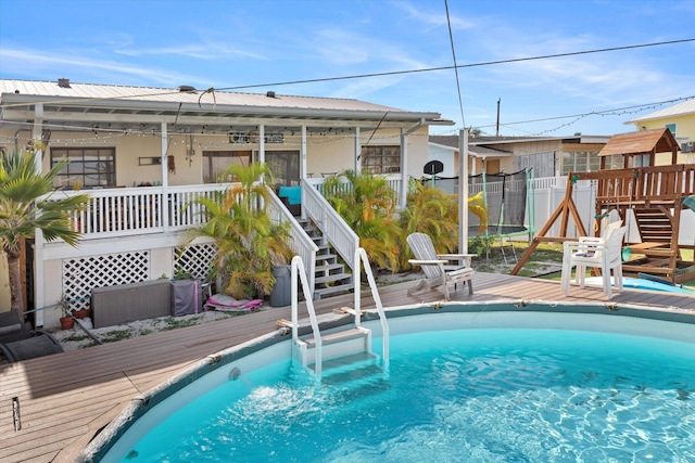 view of pool with a deck