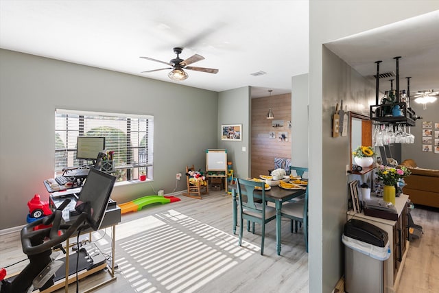 game room featuring ceiling fan and light wood-type flooring